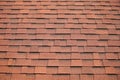 Modern color roofing material,Red asphalt roofing shingles background and texture Royalty Free Stock Photo