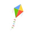 Modern colorful children s toy in form colored kite on string. Royalty Free Stock Photo