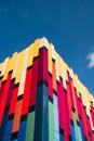 Modern colorful office building exterior with glass facade on clear sky background. Transparent glass wall of office Royalty Free Stock Photo