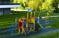 modern colorful wooden children (kids) playground (play yard, playset) Royalty Free Stock Photo