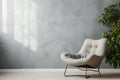 Modern comfort Light grey wall with a stylish armchair, text space
