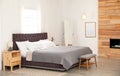 Modern comfortable bed in room Royalty Free Stock Photo