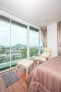 Modern comfortable, nicely bedroom city view Royalty Free Stock Photo