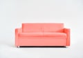 Modern comfortable pink sofa on white studio background Royalty Free Stock Photo
