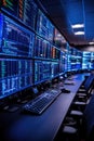 Modern command center with multiple computer screens displaying complex data and security interface in a professional environment Royalty Free Stock Photo