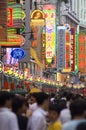 Modern commercial city street, urban shopping street with crowded people, street view of China