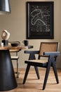 Modern composition of dining room interior with design wooden table, stylish chairs, decoration, teapot, cups, vessel, commode. Royalty Free Stock Photo
