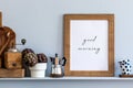 Modern composition on the kitchen interior with mock up photo frame, wooden cutting board, herbs, vegetables .