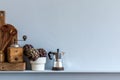 Modern composition on the kitchen interior with vegetables cutting board, food, herbs, kitchen accessories and copy space. Royalty Free Stock Photo