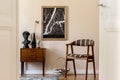 Vintage living room interior with brown mock up poster frame.