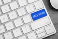 Modern computer keyboard with text FAKE NEWS on button, closeup Royalty Free Stock Photo