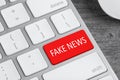 Modern computer keyboard with text FAKE NEWS on button, closeup Royalty Free Stock Photo