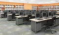 Modern Office Computer Lab with Rows of Desks and Monitors Royalty Free Stock Photo