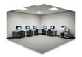 Modern computer lab setup with multiple workstations and technology equipment Royalty Free Stock Photo