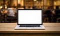 Modern computer,laptop with blank screen on table with blur cafe