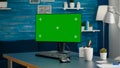 Modern computer with mock up green screen chroma key set up for personal business
