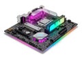 Modern computer motherboard with rgb lighting and ram sticks isolated on white background Royalty Free Stock Photo