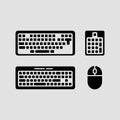 Modern computer peripheral icon set with keyboards, mouse, and numerical keypad Royalty Free Stock Photo