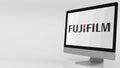 Modern computer screen with Fujifilm logo. 4K editorial clip