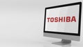 Modern computer screen with Toshiba logo. Editorial 3D rendering Royalty Free Stock Photo