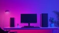 Modern computer setup on a desk illuminated by colorful lighting