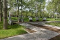 Modern concrete benches and path in a public park. Royalty Free Stock Photo