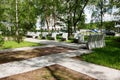 Modern concrete benches and path in a public park. Royalty Free Stock Photo