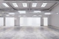 Modern concrete exhibition hall interior with empty white mock up banners and sunlight. Royalty Free Stock Photo