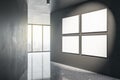 Modern concrete gallery interior with empty white mock up banners on walls and window with city view. Museum or apartment concept Royalty Free Stock Photo