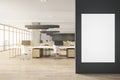 Modern concrete and wooden coworking office interior with blank white mockup poster on wall, panoramic city view, sunlight, Royalty Free Stock Photo