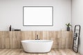 Modern concrete and wooden luxury bathroom interior with empty mock up poster and various objects. Hotel and luxury home concept. Royalty Free Stock Photo