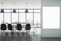 Modern concrete and wooden meeting room office interior with empty mock up poster on wall, panoramic windows, city view, Royalty Free Stock Photo