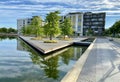 Modern condo buildings with huge windows and nice lake with jetty in the former gardening exhibition in Heilbronn