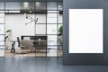 Modern conference room interior with white mock up banner on wall, glass partition, wooden flooring and bookcase. Royalty Free Stock Photo