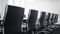 Modern Conference Room with Rows of Black Chairs and Table Royalty Free Stock Photo
