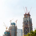 Modern construction. Crane building a new skyscraper. Royalty Free Stock Photo