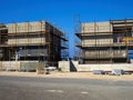 Modern construction site with scaffold platform sytem Royalty Free Stock Photo