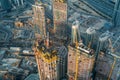 Modern construction sites of high rise building in Dubai, view from above