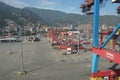 Modern container terminal in the Port of La Guaira observed from cargo ship moored below gantry cranes. Royalty Free Stock Photo