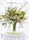 Modern contemporary big flower bouquet centerpiece at event. Royalty Free Stock Photo