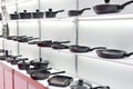 Modern cooking pans in store