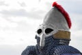 Modern copy of antique metal knight helmet with aventail. Historical medieval costume detail