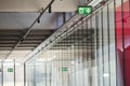 Modern corridor with emergency exit signs Royalty Free Stock Photo