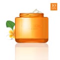 Modern cosmetics ads, nutritive facial cream. Elegant orange gold glass open bottle with cream, on white with flower of p Royalty Free Stock Photo