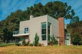 Modern country house with garden and trees