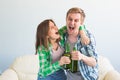 Soccer world cup concept - Modern couple looking excited and happy watching sport game on tv Royalty Free Stock Photo