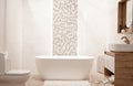 Modern and cozy bathroom interior with decorative elements Royalty Free Stock Photo