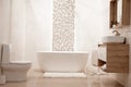Modern and cozy bathroom interior with decorative elements Royalty Free Stock Photo