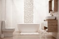 Modern and cozy bathroom interior with decorative elements Royalty Free Stock Photo