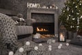 Modern cozy interior in gray shades with an armchair in front of fireplace and decorated Christmas tree. Royalty Free Stock Photo